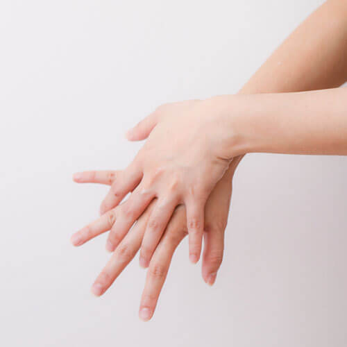 rub the sanitizer on both hands and on the front and back.