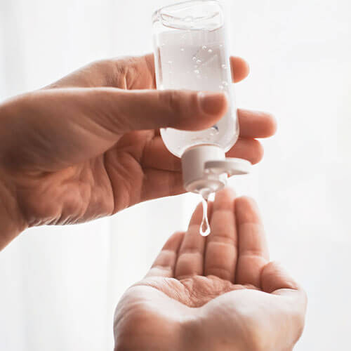 take a few drops of the anti bacterial hand sanitizer on one palm.