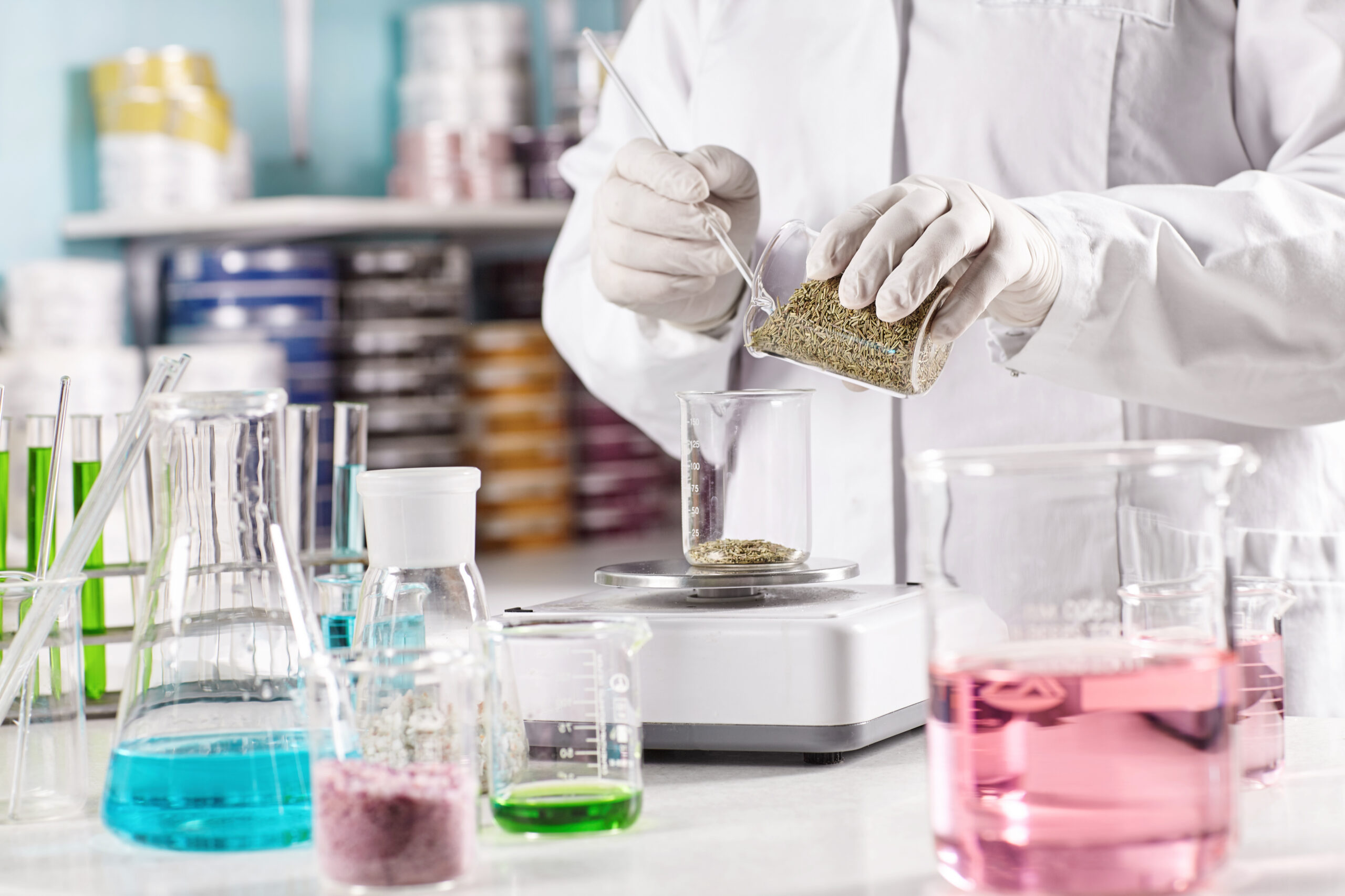 R&D chemist formulating cosmetic products in the Glamcos lab