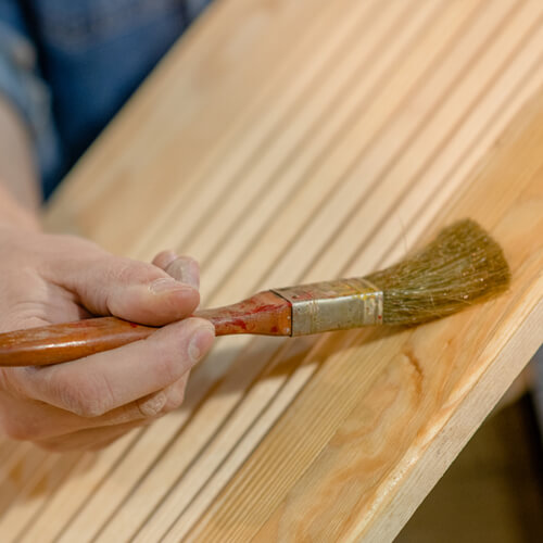 apply furniture polish